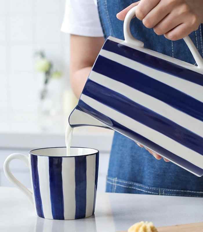 Set of 2 Blue Ceramic Cups Hand-Painted White & Blue