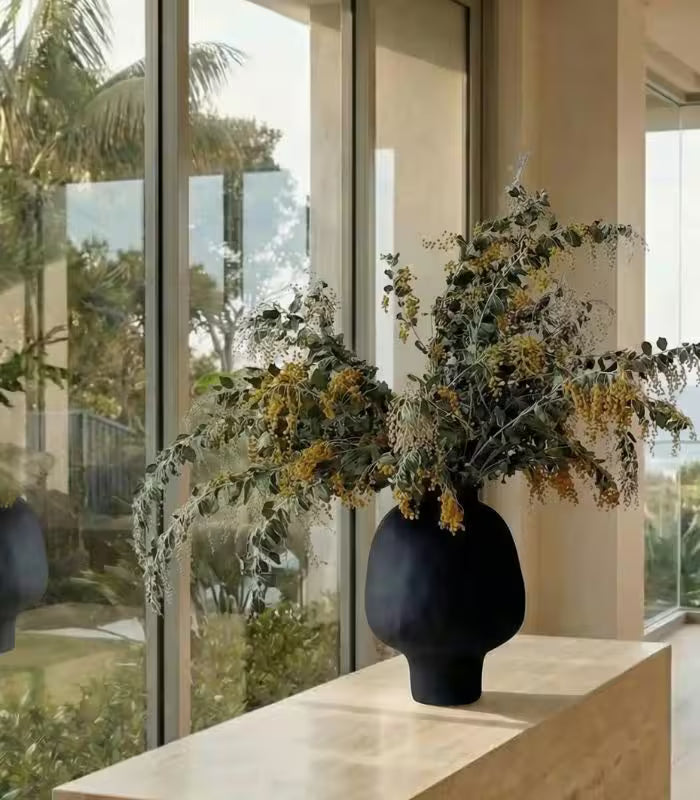 Aurelia Handcrafted Ceramic Vase – Modern Black Spherical Pedestal Design