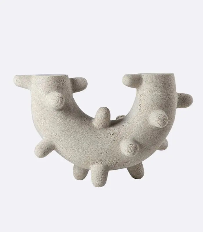 Curved Cylindrical Sculpture with Elongated Spheres