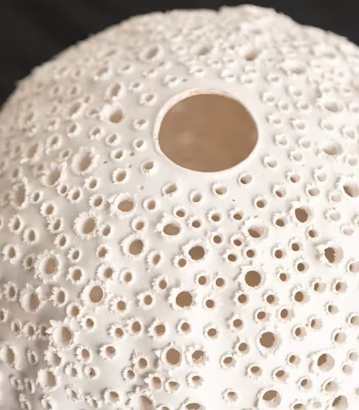 Riccio Handcrafted Ceramic Vase – Textured Spherical Form in Cream