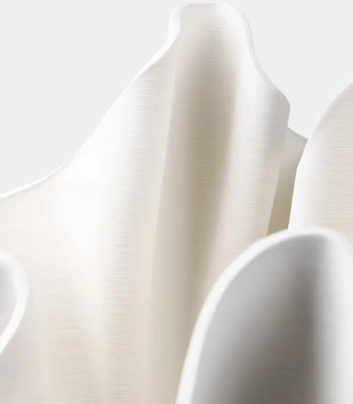 Textured Ribbon Ceramic Vase – Handcrafted Flowing Design