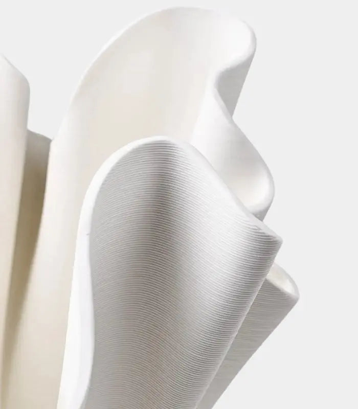 Textured Ribbon Ceramic Vase – Handcrafted Flowing Design