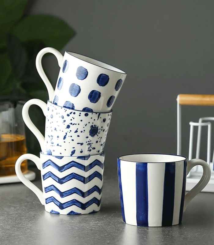 Set of 2 Blue Ceramic Cups Hand-Painted White & Blue