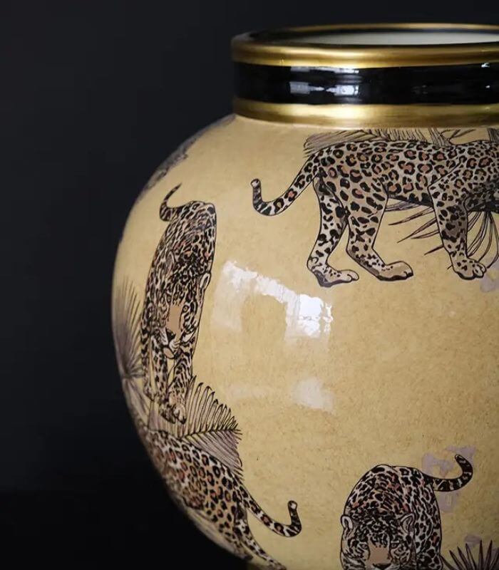 Handcrafted porcelain vase in safari style by Last Aristocrat company, featuring intricate animal print designs in earthy tones